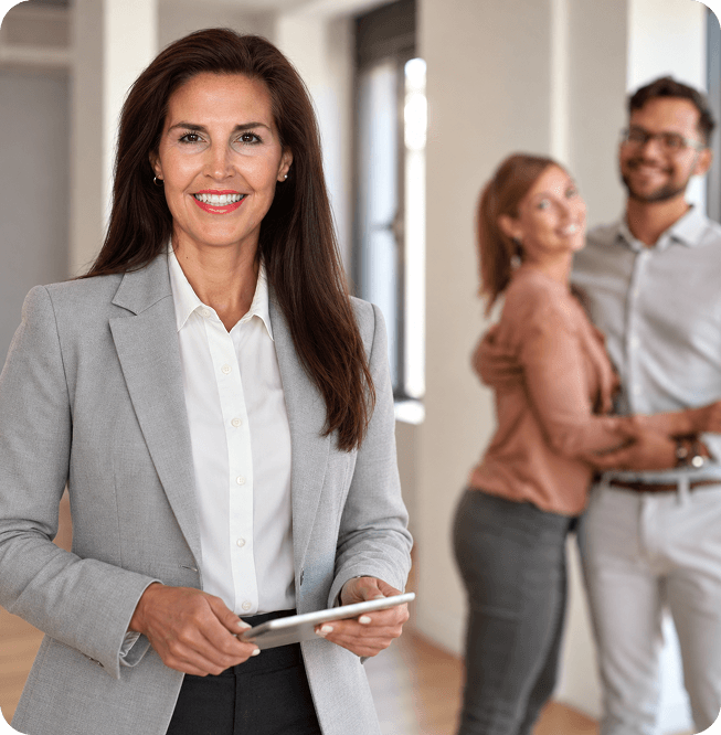 Hardy Real Estate agent welcoming clients to a new home